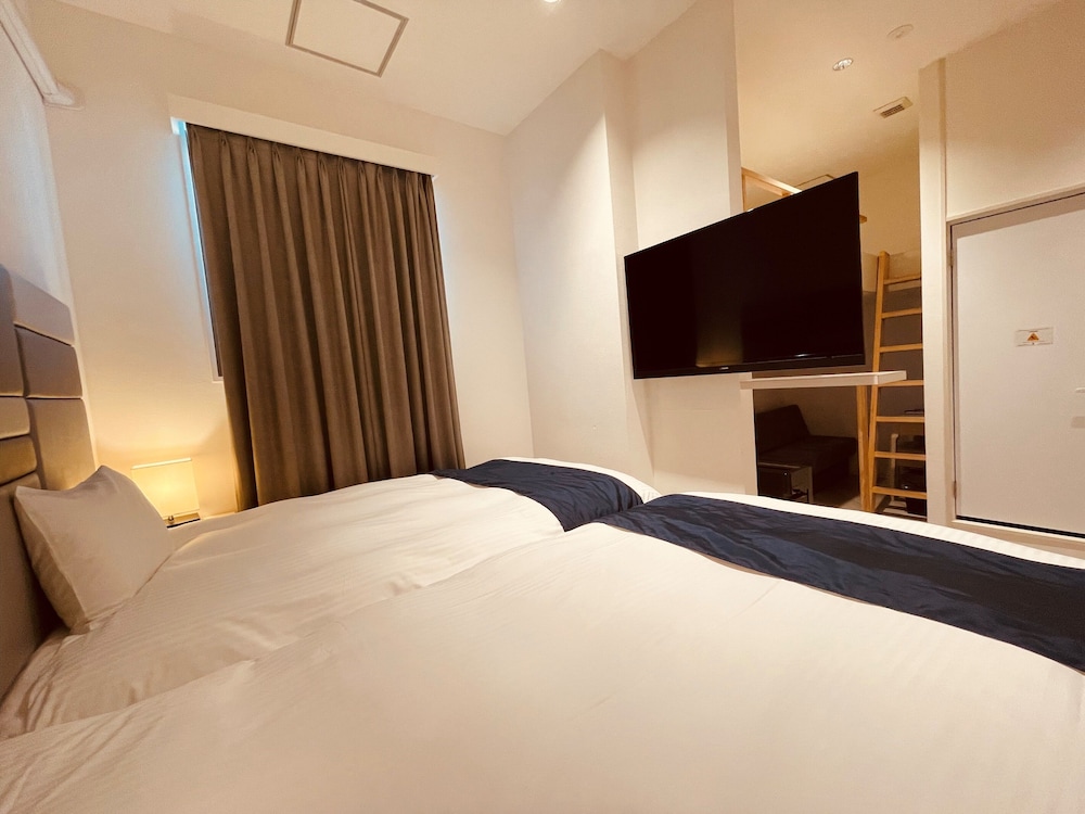 エグゼクティブ ツインルーム 禁煙 (A) 客室1 | フェニックス パーク ホテル