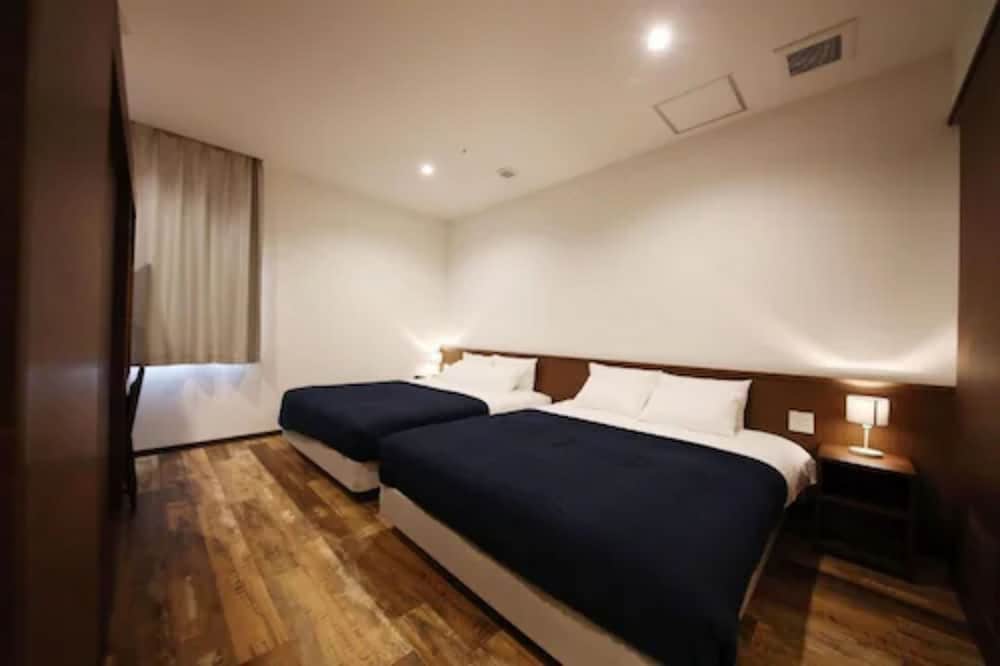 スイートルーム ダブルベッド2台&コーナーソファ1台 禁煙 客室2 | ゾンクホテル博多