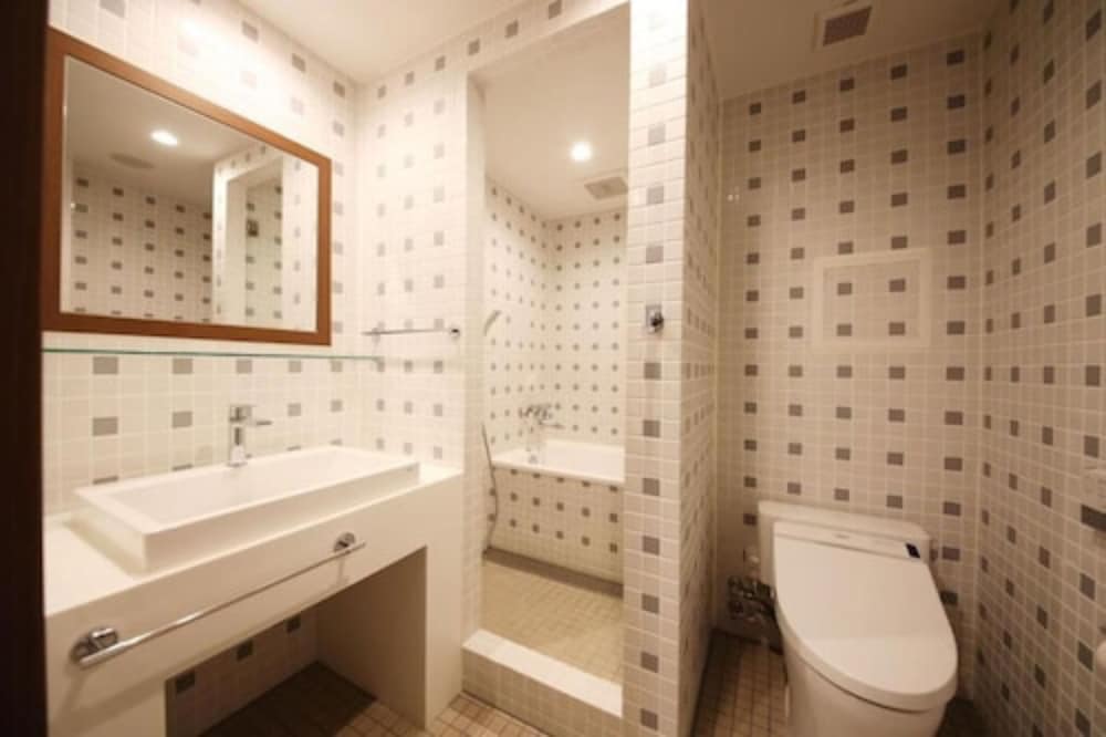 デラックスツインルーム セミダブルベッド2台&ソファ1台 禁煙 バスルーム0 | ゾンクホテル博多