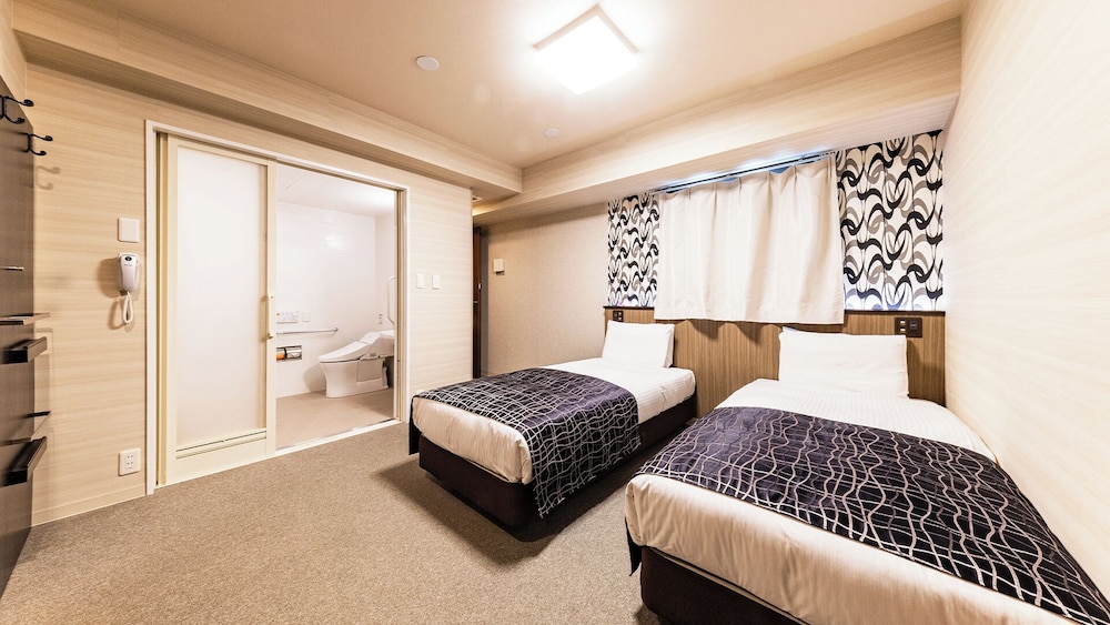 ユニバーサルツインルーム禁煙 | アパホテル〈なんば南大国町駅前〉