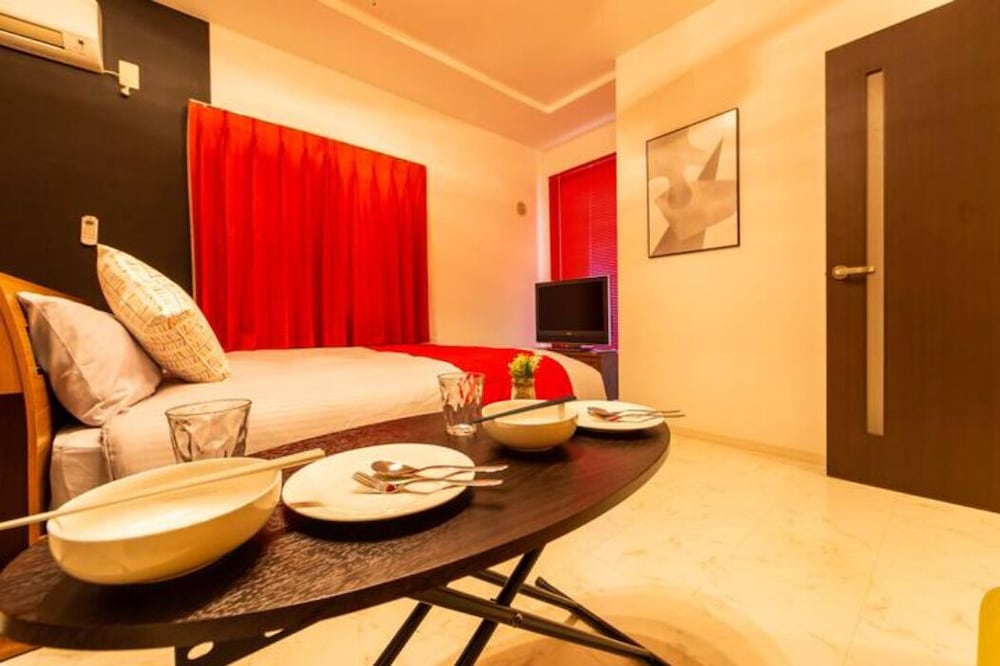 ダブルまたはツインルーム リビング エリア3 | ORANGE