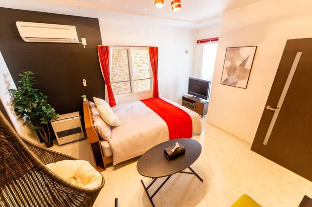 ダブルまたはツインルーム リビング エリア0 | ORANGE