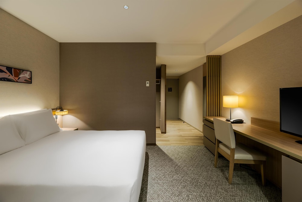 デラックス ルーム クイーンベッド 1 台 オーシャンビュー 客室1 | ヒルトン・ガーデン・イン横浜みなとみらい