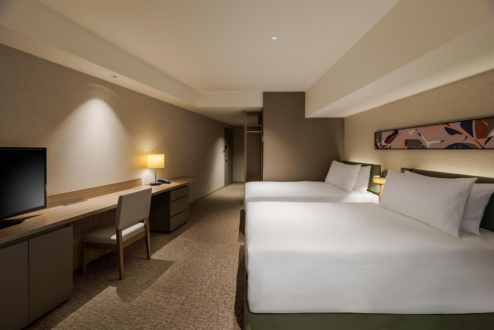 デラックス ルーム シングルベッド 2 台 オーシャンビュー (Family) | ヒルトン・ガーデン・イン横浜みなとみらい