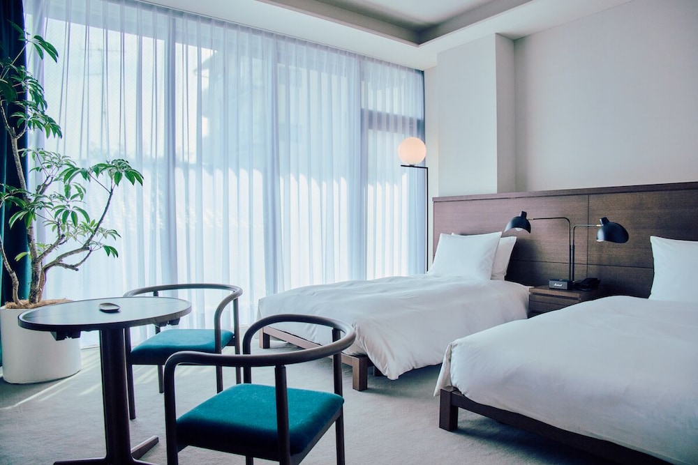 スタンダードツイン ラウンジ利用込 (安藤忠雄氏デザイン) 禁煙 客室3 | 丸福樓