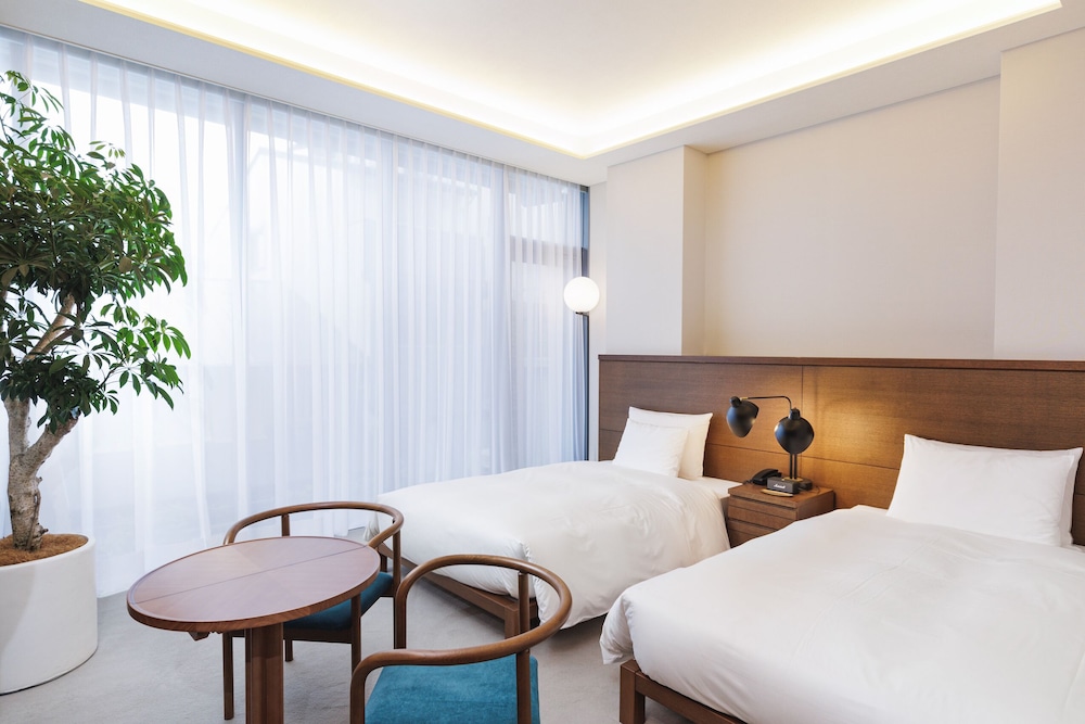 スタンダードツイン ラウンジ利用込 (安藤忠雄氏デザイン) 禁煙 | 丸福樓