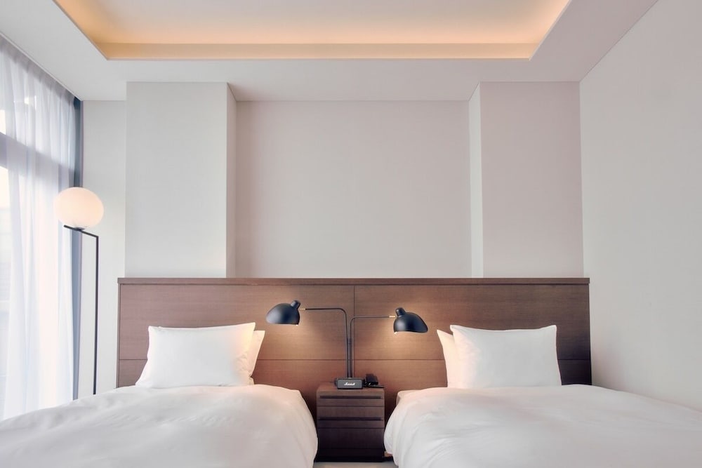 スタンダードツイン ラウンジ利用込 (安藤忠雄氏デザイン) 禁煙 客室4 | 丸福樓