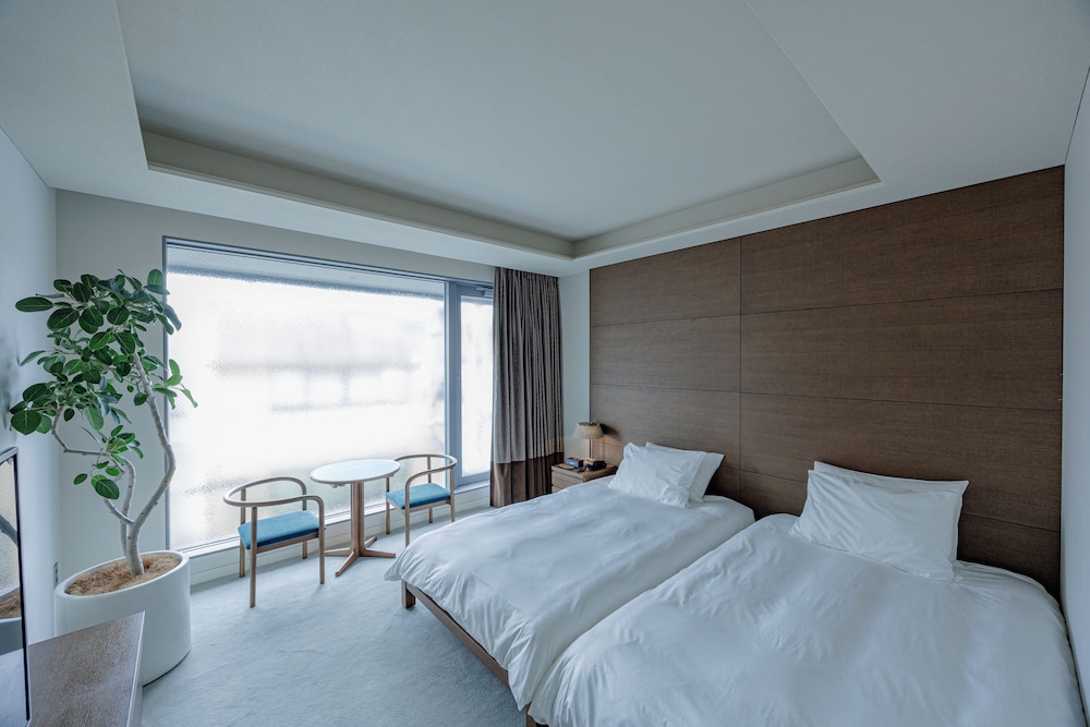 スタンダードツイン ラウンジ利用込 (安藤忠雄氏デザイン) 禁煙 客室6 | 丸福樓