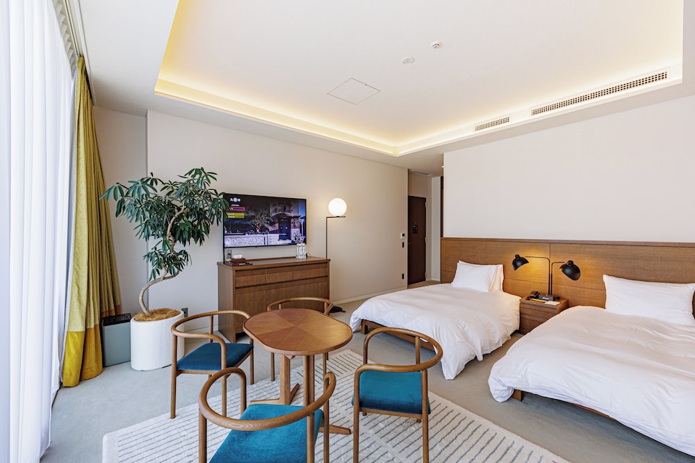 スーペリアツイン ラウンジ利用込 (安藤忠雄氏デザイン) | 丸福樓