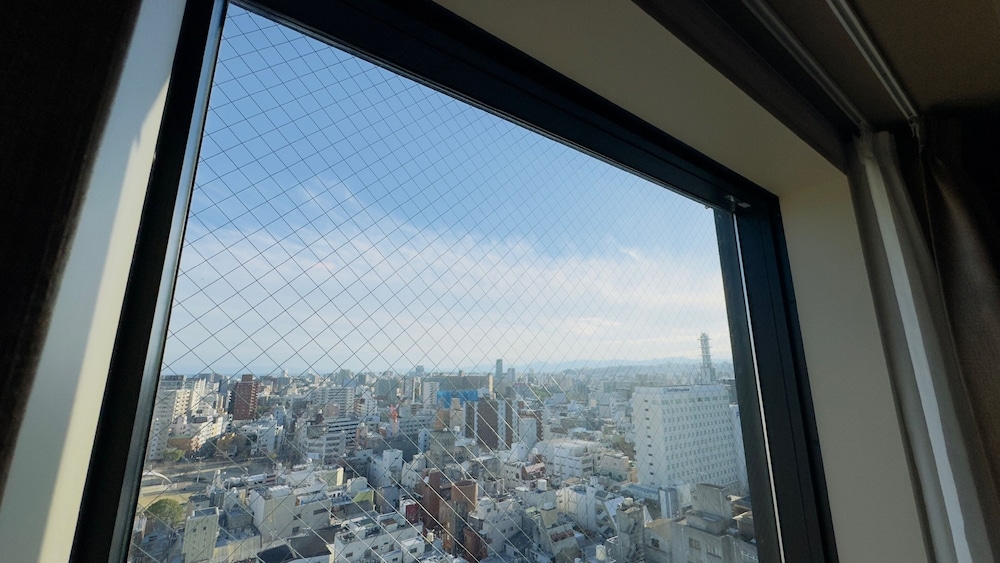 スーペリアダブル桜島側 (2名利用) 禁煙 部屋からの景観1 | ダイワロイネットホテル鹿児島天文館 PREMIER