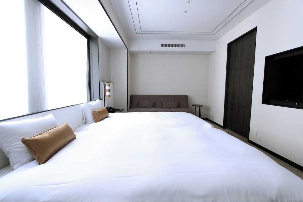 デラックスツインルーム　ユニバーサル 禁煙 [部屋定員：6歳以上2名, 0-5歳 2名] 客室7 | KOKO HOTEL Premier 日本橋浜町