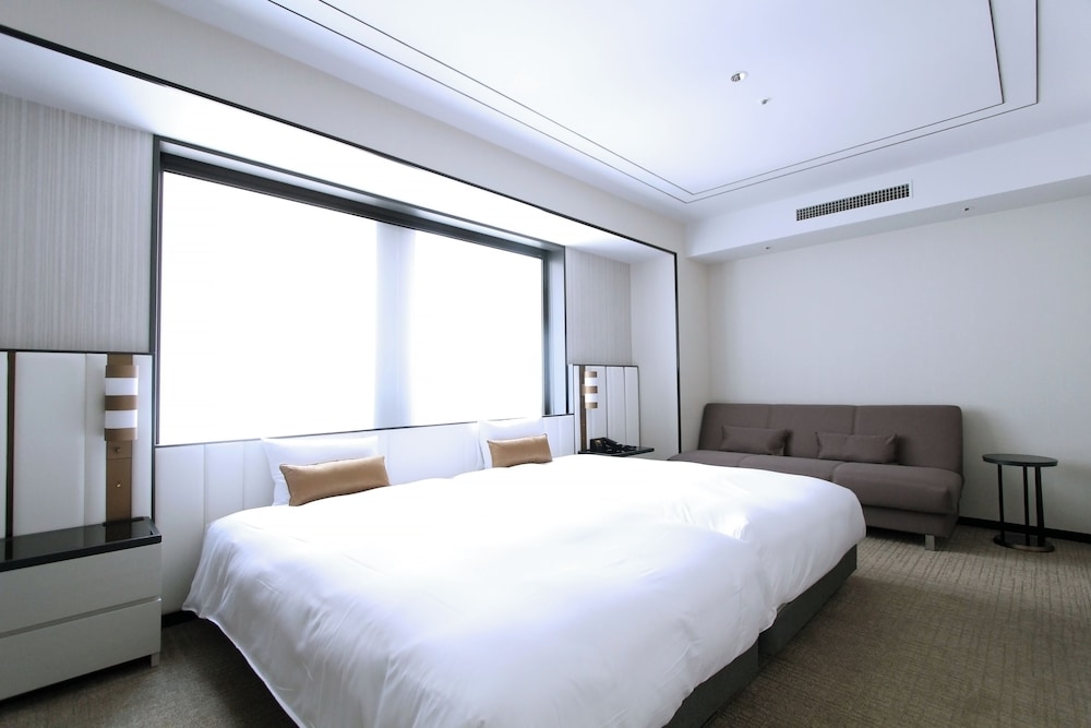 デラックスツインルーム　ユニバーサル 禁煙 [部屋定員：6歳以上2名, 0-5歳 2名] 客室2 | KOKO HOTEL Premier 日本橋浜町