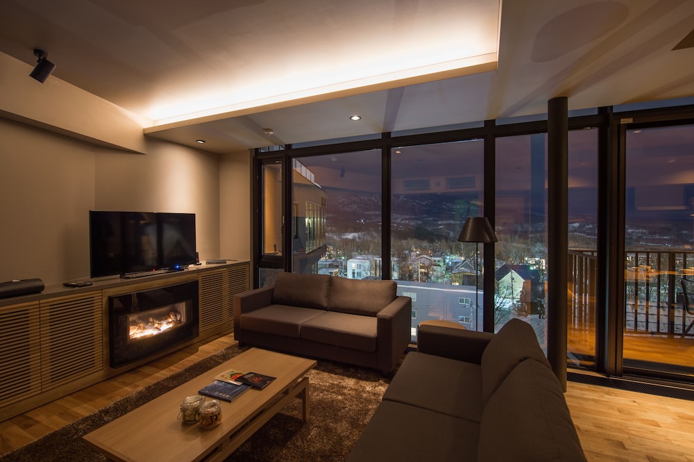 アパートメント 2 ベッドルーム リビング エリア3 | Aspect Luxury Apartments by H2 Life