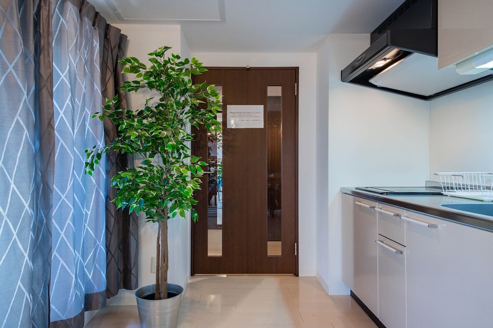 ダブルまたはツインルーム リビング エリア2 | CLASSE QUATRE