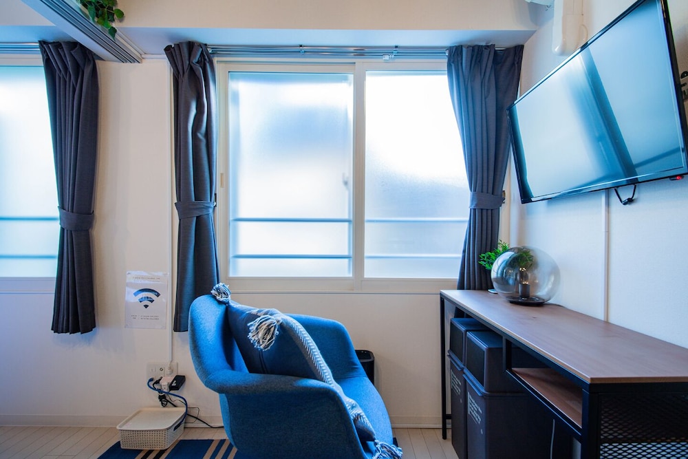 ダブルまたはツインルーム リビング エリア1 | CLASSE QUATRE