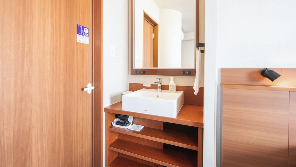 コンフォート ダブルルーム 禁煙 バスルームのシンク0 | ベッセルホテル都城