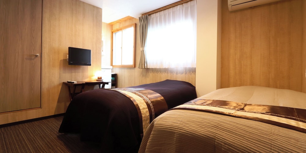 ツインルーム (禁煙) 客室2 | 温泉ビジネスホテル富喜屋