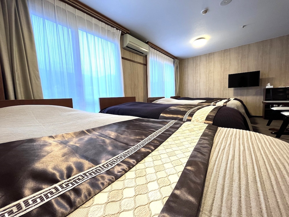 フォースルーム (禁煙) 客室1 | 温泉ビジネスホテル富喜屋