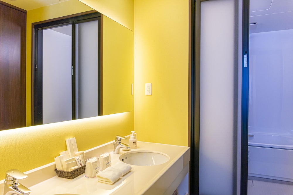 デラックスツイン 禁煙 - ポムポムプリン バスルームのシンク1 | ホテル 沖縄 with サンリオ キャラクターズ