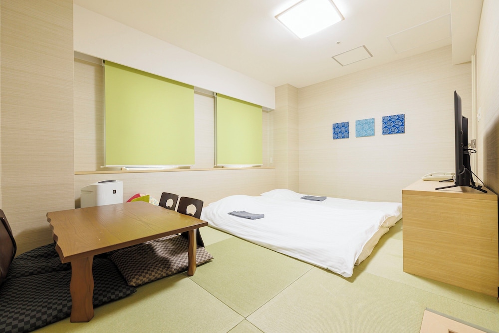 プレミアム ルーム ベッド (複数台) | ANAホリデイ・イン札幌すすきの by IHG