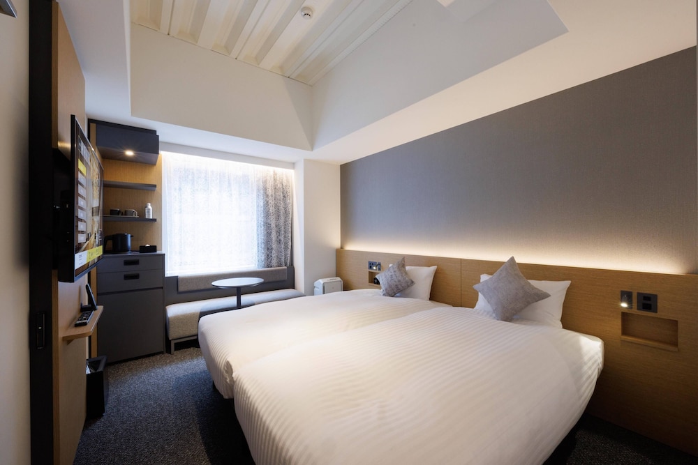 コネクトルーム（2シングルベッド＋1クイーンベッド） 客室1 | クロスライフ博多柳橋