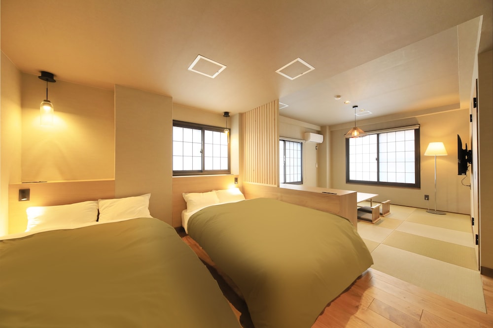 4 人部屋 ベッド (複数台) 客室3 | ゆとりろ津和野