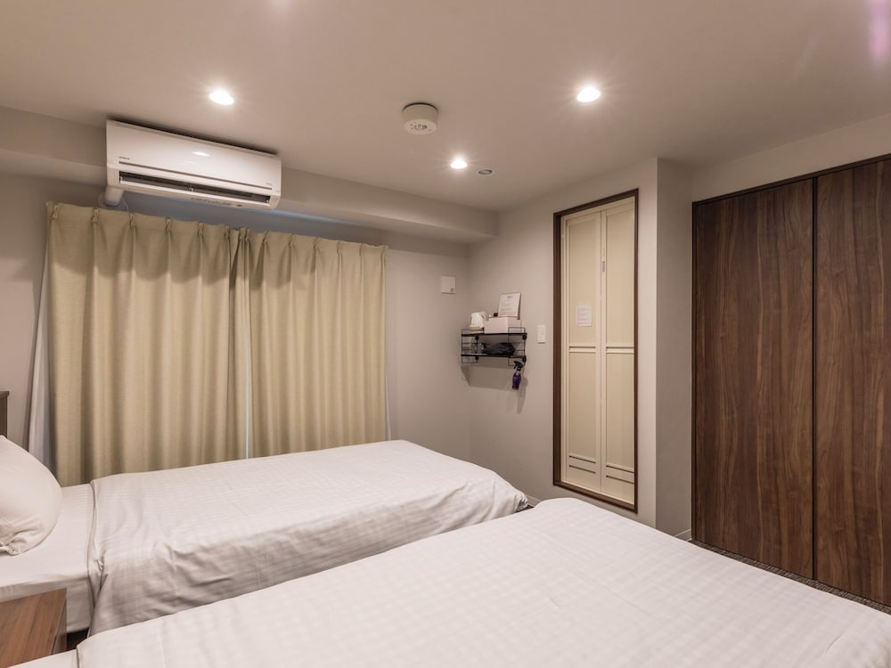 スタンダード ツインルーム シングルベッド 2 台 禁煙 客室14 | 大阪えびすホテル