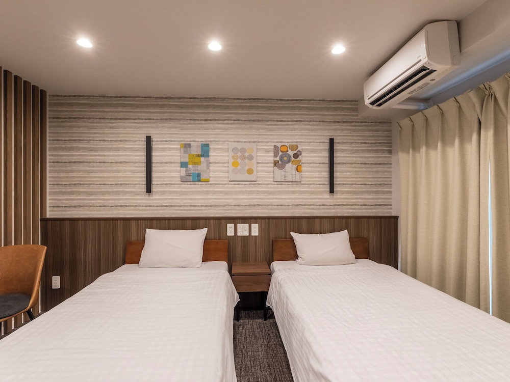 スタンダード ツインルーム シングルベッド 2 台 禁煙 客室11 | 大阪えびすホテル