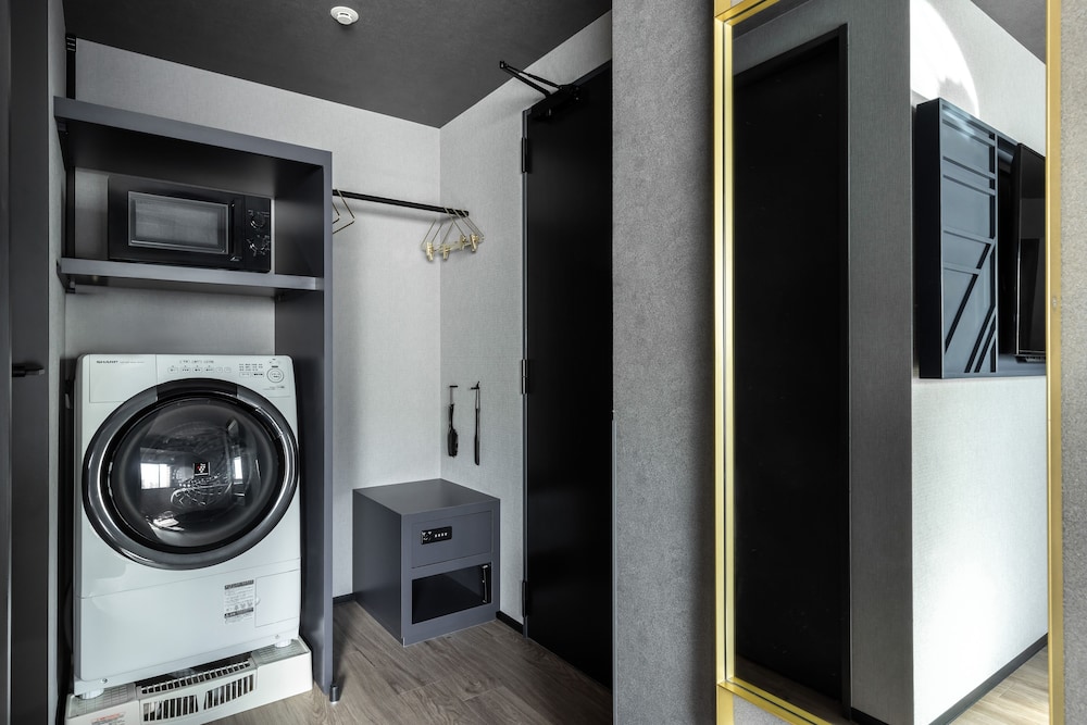 デラックス ツインルーム コーナー (with Washing Machine) 客室1 | 東急ステイ メルキュール 大阪なんば
