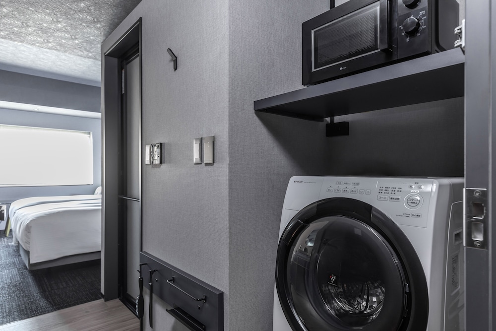スーペリア ツインルーム シングルベッド 2 台 (with Washing Machine) 客室3 | 東急ステイ メルキュール 大阪なんば