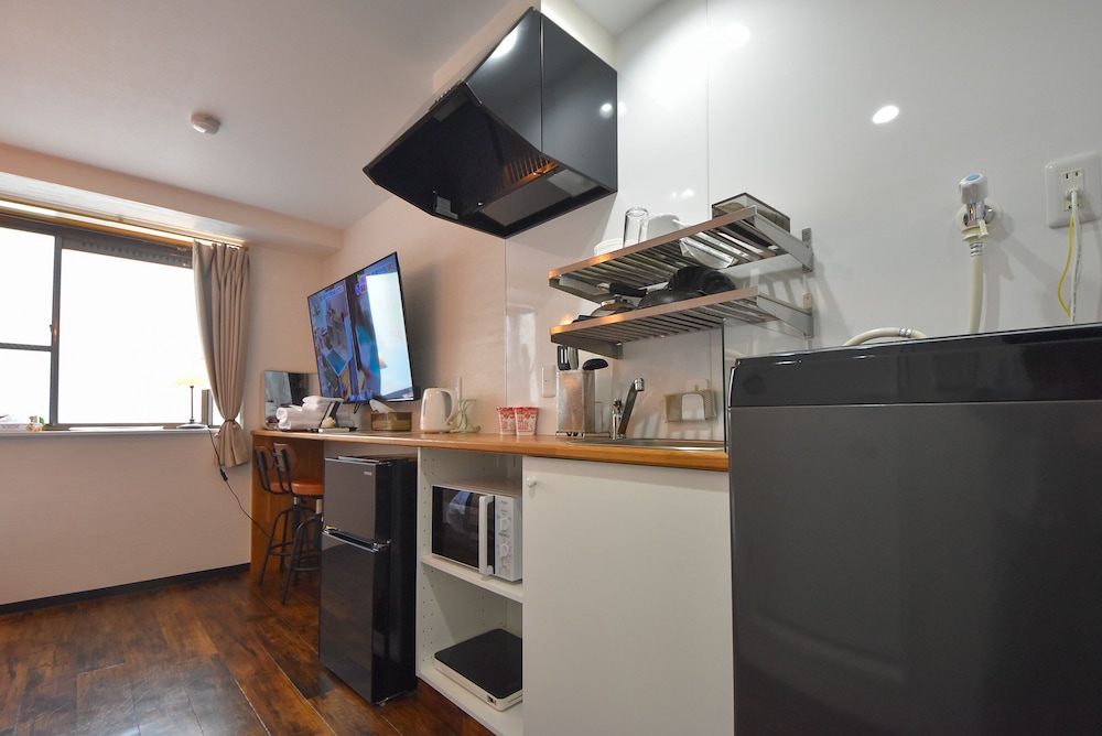 ベーシック アパートメント ダブルベッド 1 台 禁煙 1 階 専用簡易キッチン0 | コンフィーステイ桜町