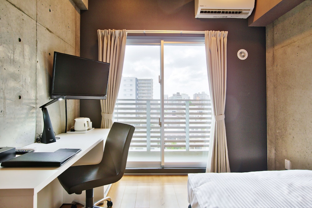 新館カジュアルダブル 禁煙 客室2 | 那覇ウエスト イン