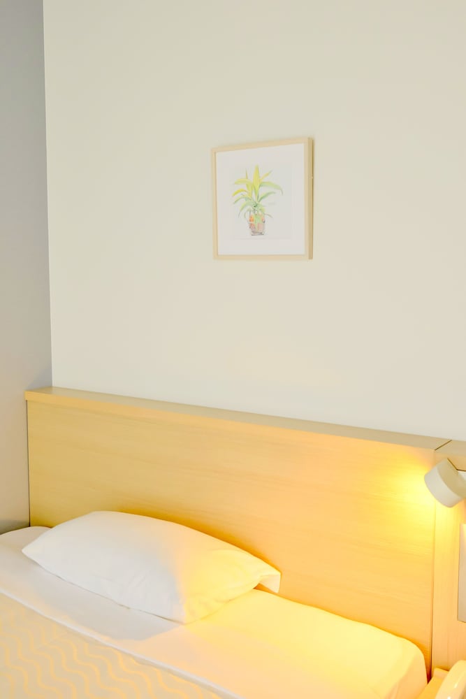 セミダブルルーム　禁煙 客室1 | ホテル　ライジング サン 宮古島