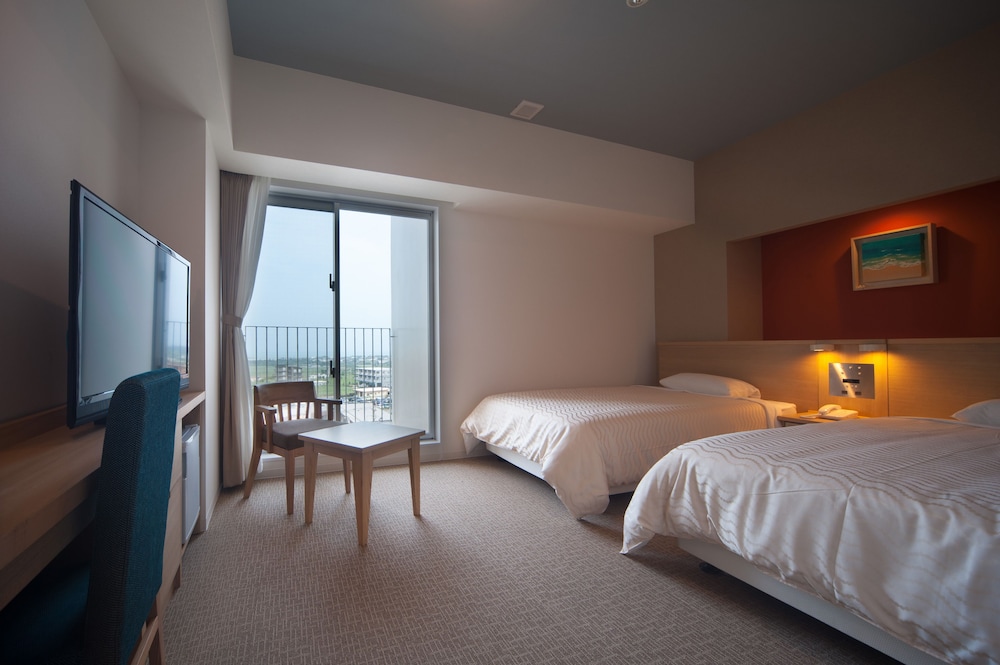 デラックス ツインルーム 禁煙 リビングルーム0 | ホテル　ライジング サン 宮古島