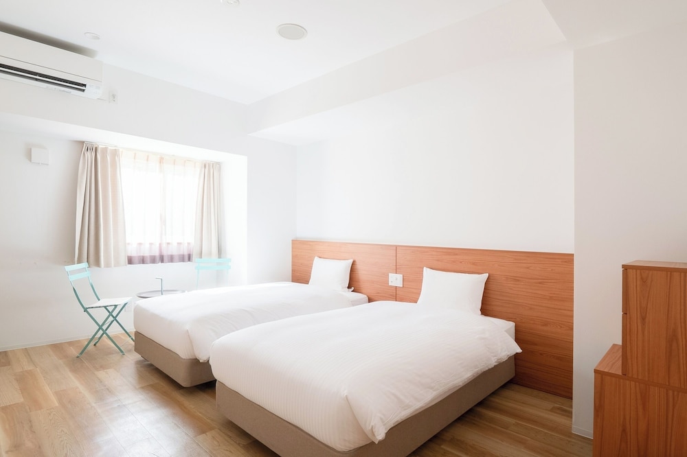 ユニバーサルルーム 禁煙 | スマイルホテル宮古島