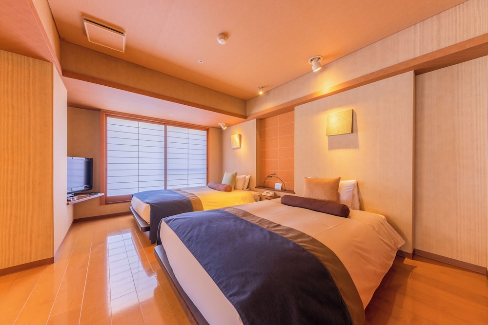 [集粋庵] 川側 かけ流し露天風呂付和洋室 (70平米) | ホテル河鹿荘