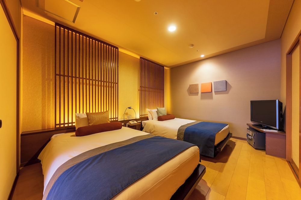 [集粋庵] 街側 かけ流し露天風呂付和洋室 (70平米) 客室2 | ホテル河鹿荘