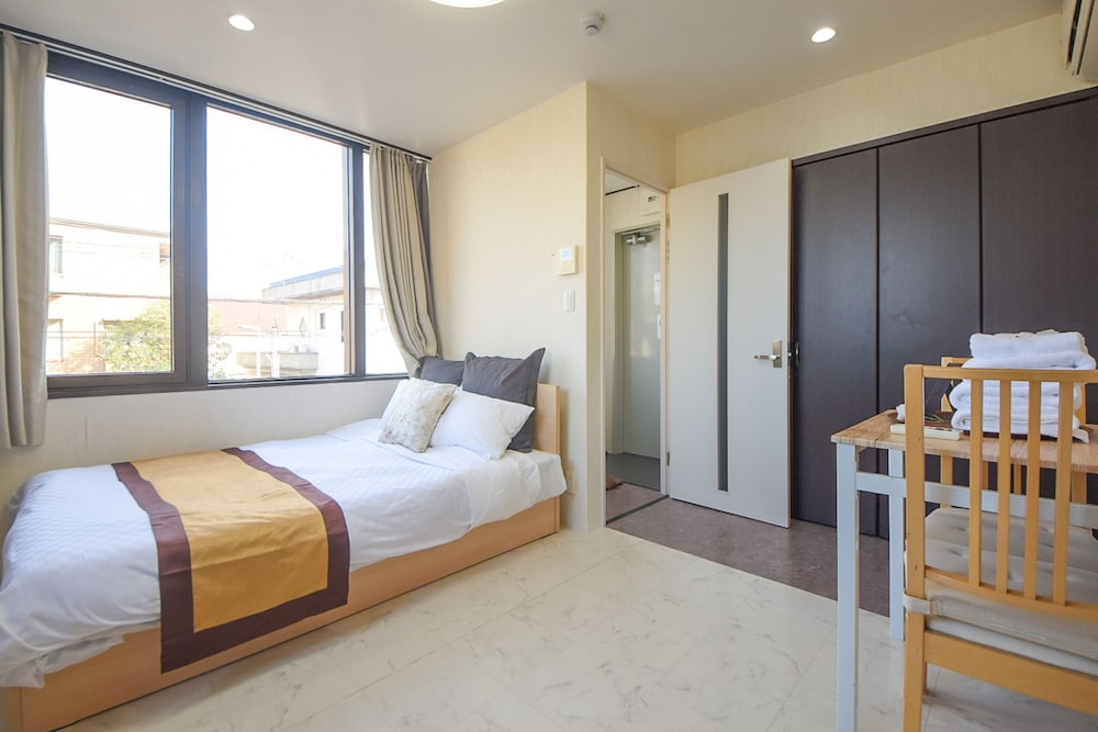 ベーシック ダブルルーム ベッド (複数台) 禁煙 中 2 階 客室1 | コンフィーステイ清川