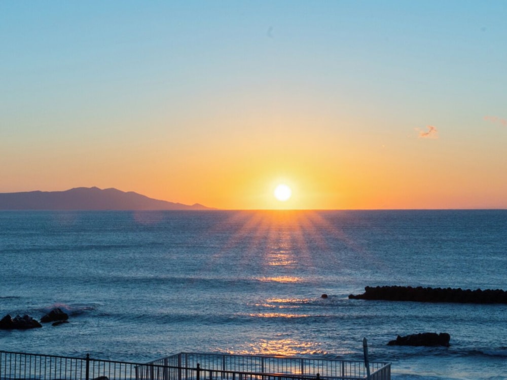 [河津浜一望 レトロモダン角部屋 ~御蔵~] 温泉掛流し露天風呂 バルコニーからの眺望2 | 磯あるきの湯宿 潮雲