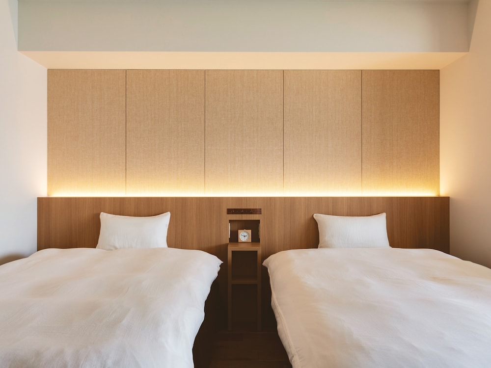 デラックス洋室 禁煙 / 50平米 (専用バスルーム - バリアフリー仕様) | 江田島荘