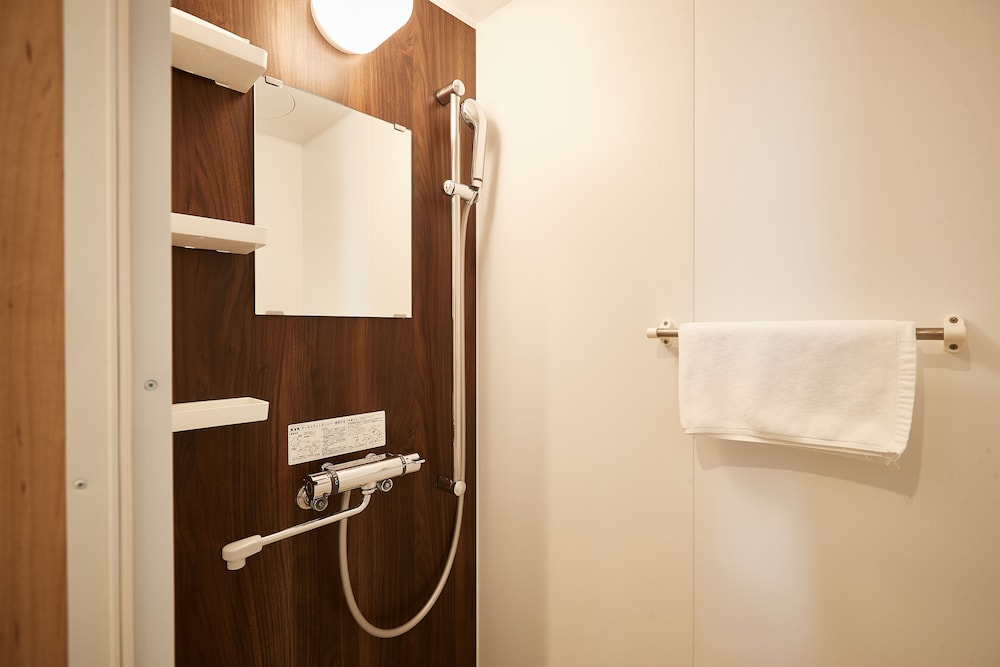 スタンダード ダブルルーム バスルーム0 | New Normal Hotel in NAGO
