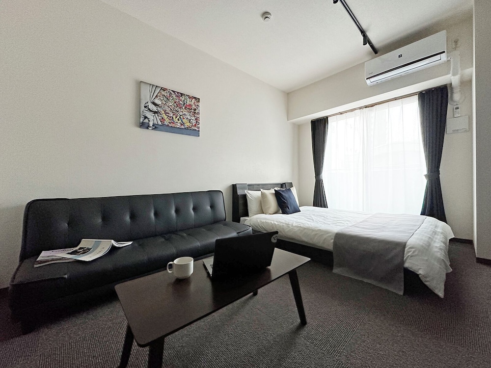 エコノミー スタジオ ダブルベッド 1 台ソファーベッド付き 客室4 | NAGOMI