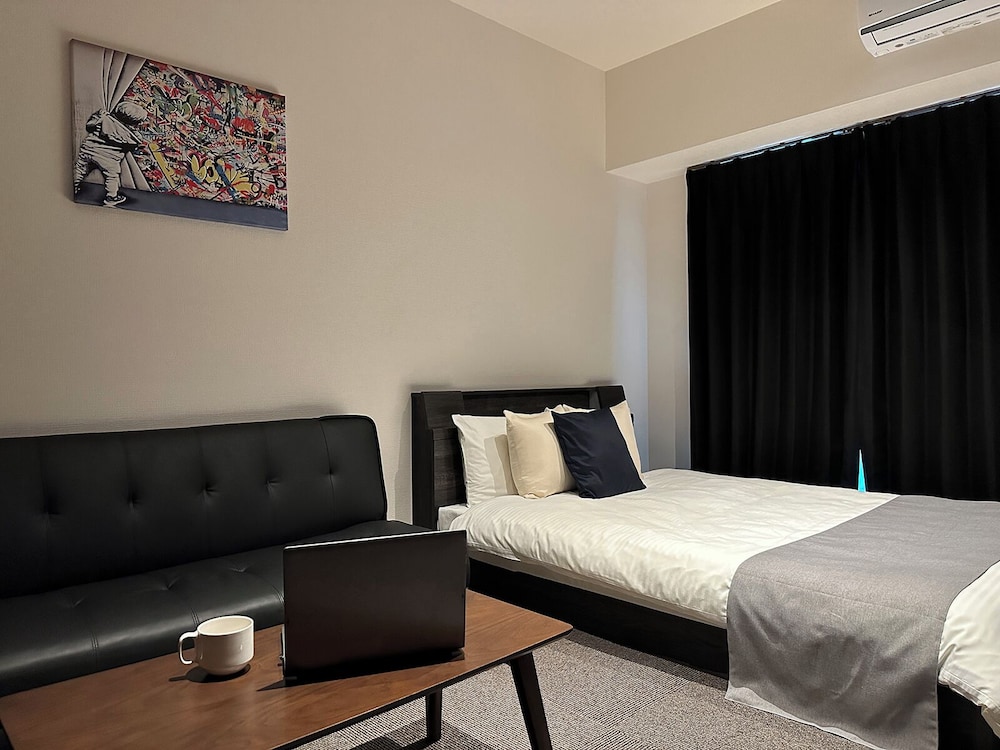 クラシック スタジオ ダブルベッド 1 台ソファーベッド付き 客室3 | NAGOMI