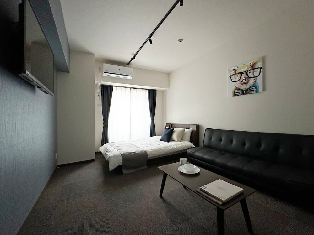 シティ スタジオ ダブルベッド 1 台ソファーベッド付き 客室2 | NAGOMI