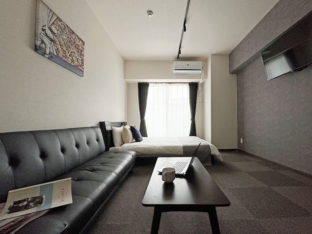 クラシック スタジオ ダブルベッド 1 台ソファーベッド付き 客室4 | NAGOMI