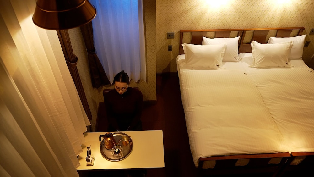 JUNKISSA twin (シングルベッド2台、ロフトシングルマット2枚) 禁煙 客室内のダイニングエリア0 | COFFEE HOTEL Soundwave