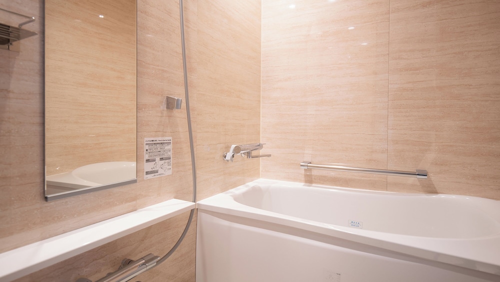 スーペリア ツインルーム 禁煙 バスルーム0 | レフ沖縄アリーナ by ベッセルホテルズ