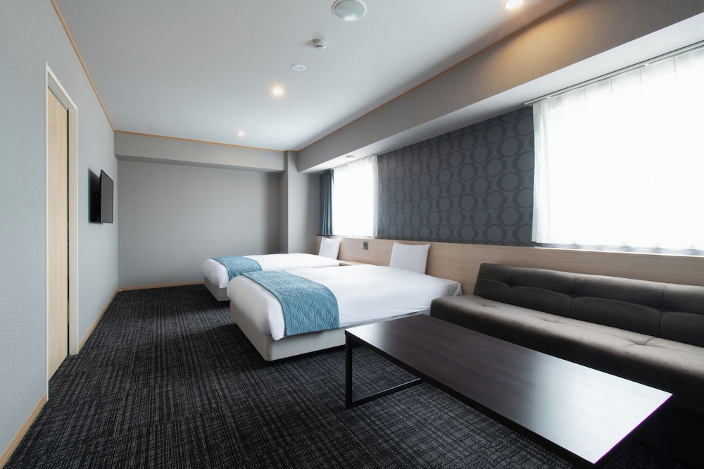 デラックス ツインルーム ダブルベッド 2 台 禁煙 客室1 | ベッセルホテル広島 平和大通り