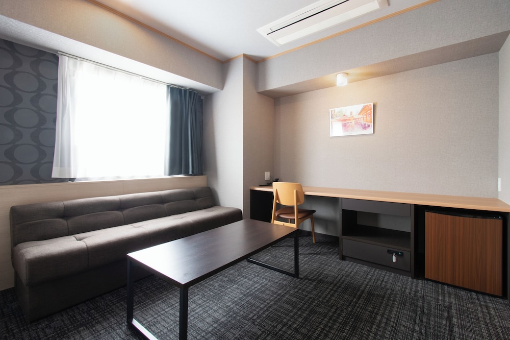 デラックス ツインルーム ダブルベッド 2 台 禁煙 客室3 | ベッセルホテル広島 平和大通り