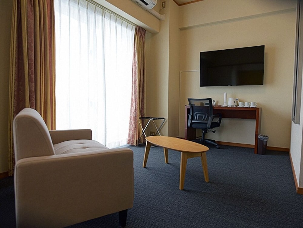 ベーシック トリプルルーム 3 ベッドルーム リビング エリア0 | ジスコホテル小浜温泉